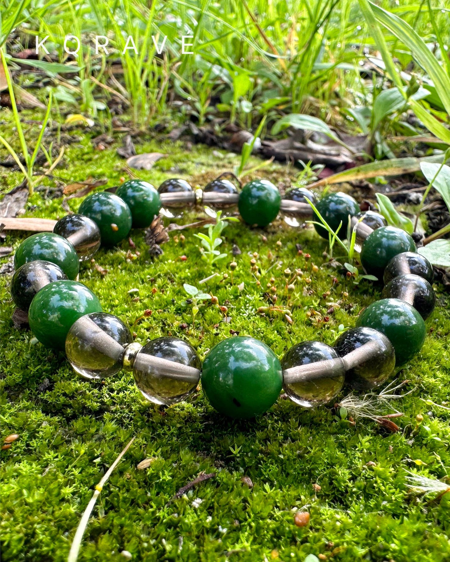 Green jasper and smoky quartz bracelet photographed in a natural landscape setting