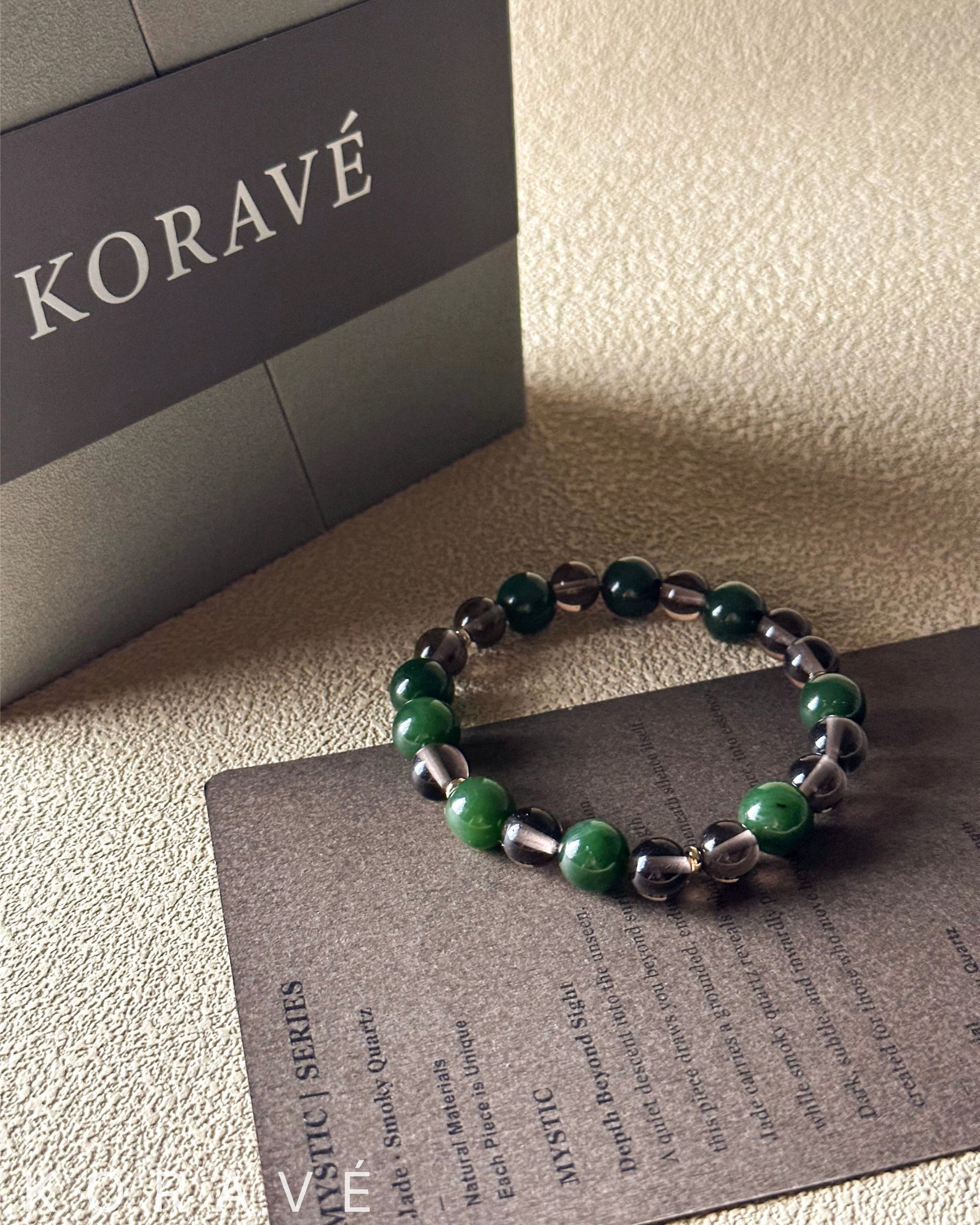 Green jasper and smoky quartz bracelet presented in elegant packaging with natural simplicity