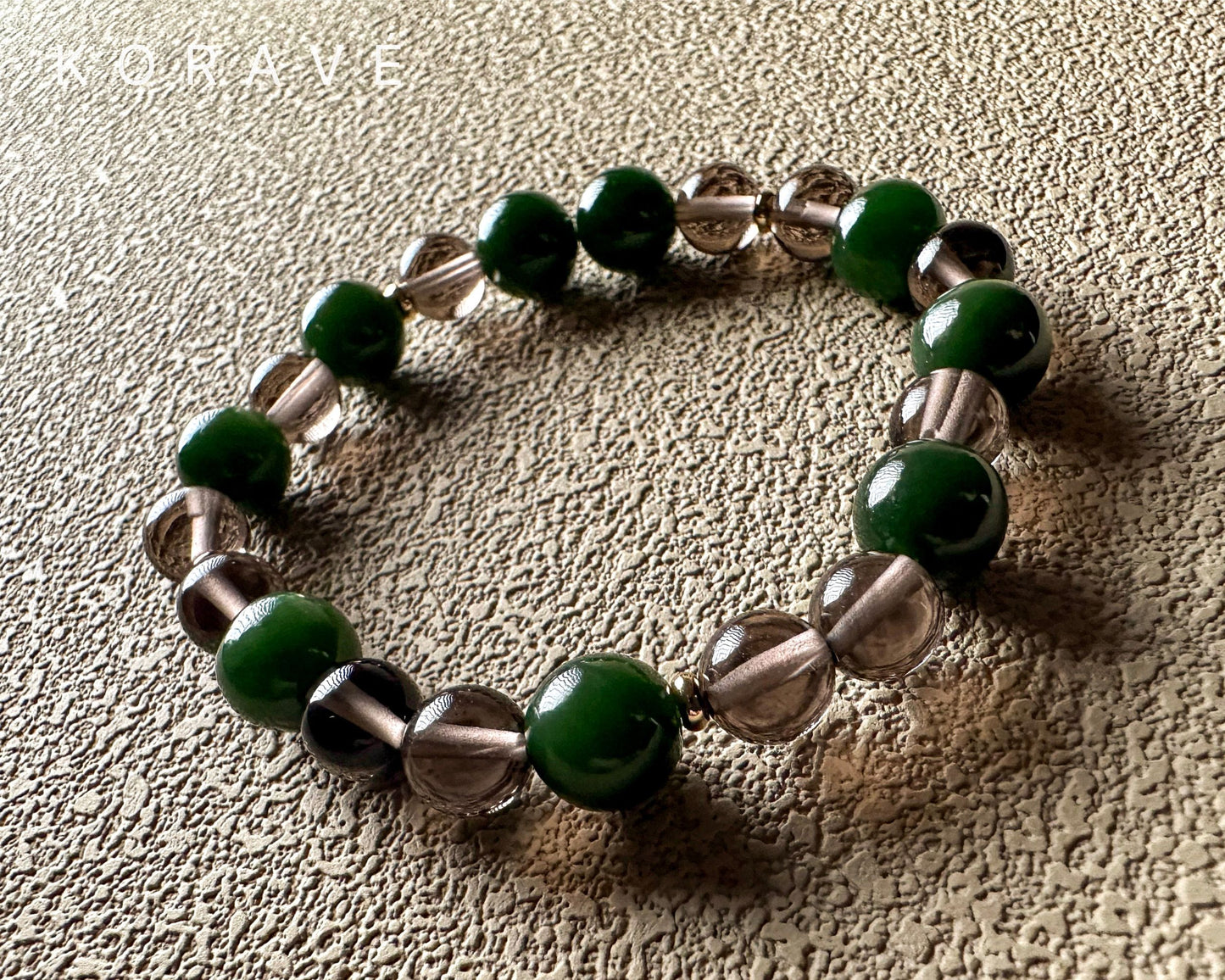 Green jasper and smoky quartz bracelet showcasing natural colors and handmade details