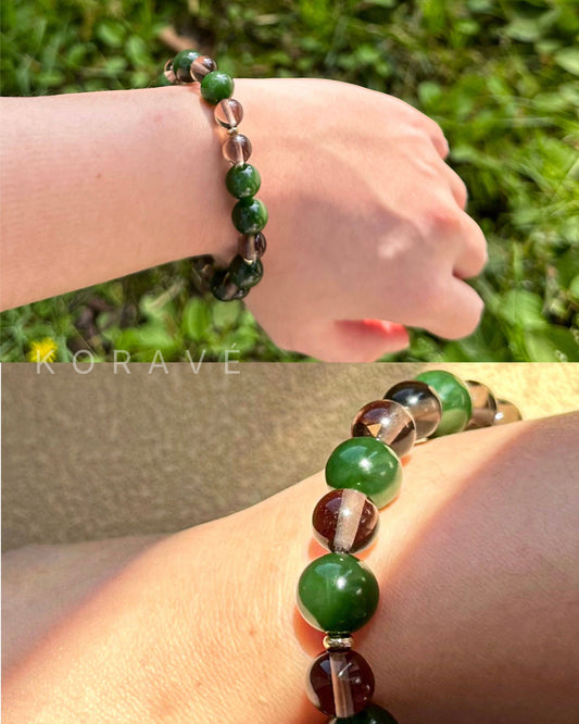 Green jasper and smoky quartz bracelet worn on wrist with calm earthy tones