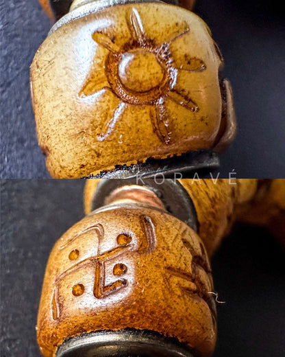 Natural yak bone bracelet showing handcrafted carving details and unique bone texture
