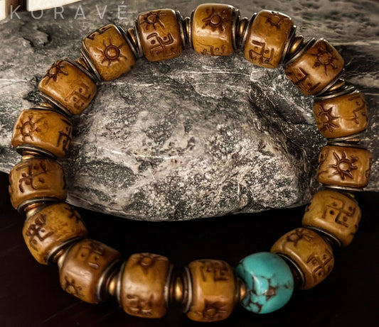 Handmade yak bone bracelet incorporating Tibetan heritage elements and traditional craftsmanship