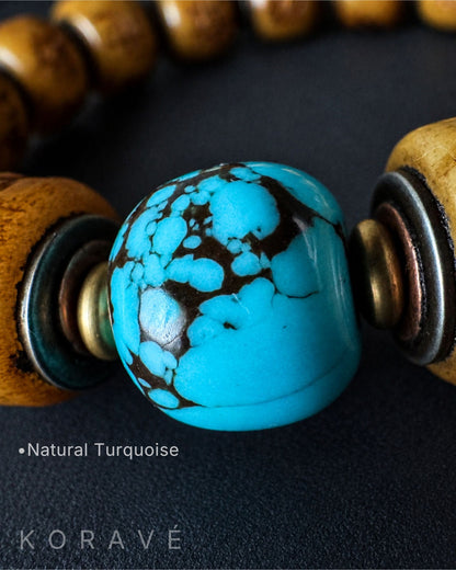 Yak bone bracelet featuring turquoise accent detail